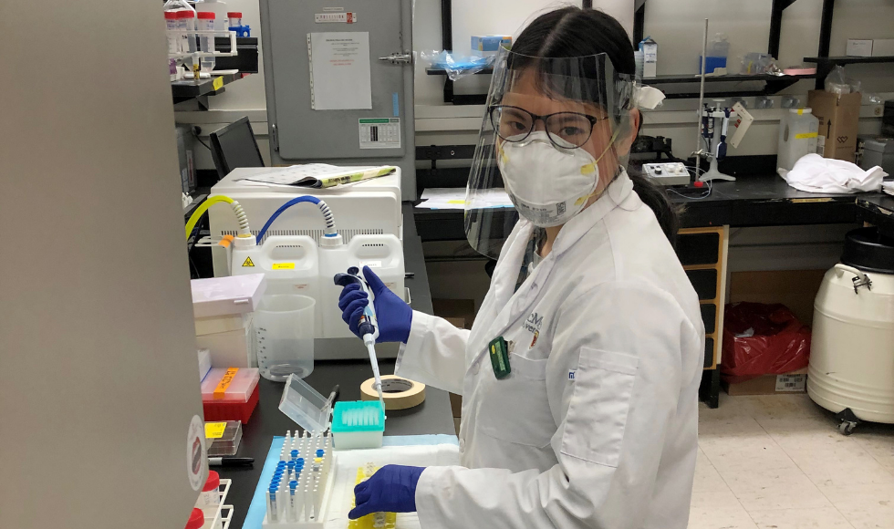 Angela Huynh working in the lab.